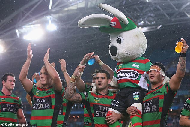 Reggie Rabbit celebrates a victory with the South Sydney Rabbitohs in 2013. He has worn the suit since 2002.
