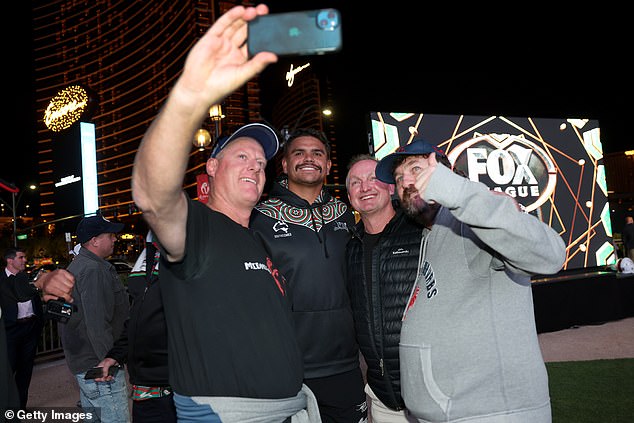 South Sydney fullback Latrell Mitchell poses with fans in Las Vegas as the NRL prepares to launch its season on the bright strip.
