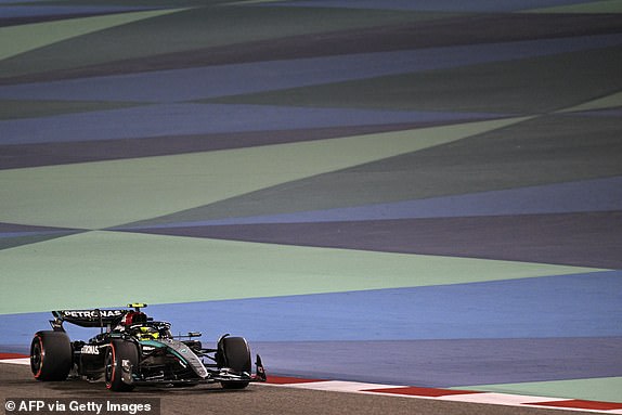 TOPSHOT - British Mercedes driver Lewis Hamilton drives during the second free practice session of the Bahrain Formula One Grand Prix at the Bahrain International Circuit in Sakhir on February 29, 2024. (Photo by ANDREJ ISAKOVIC / AFP) (Photo by ANDREJ ISAKOVIC/AFP via Getty Images)
