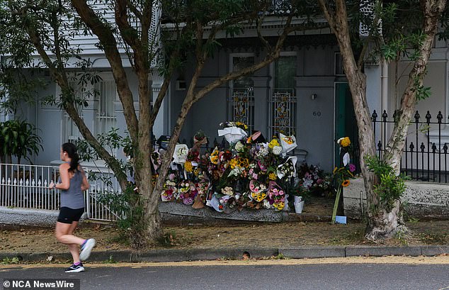 Dozens of tributes have been left at Baird's rented terrace house in Paddington (pictured)