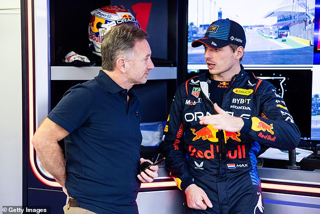 Horner and current Formula One world champion Max Verstappen talk at the Bahrain circuit