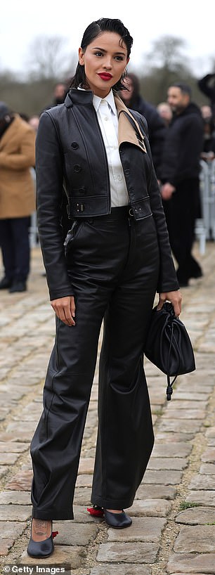 Eiza González, 34, wowed in an elegant short black leather jacket with beige lining.