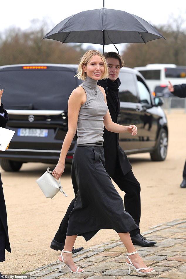 Princess Maria Olympia of Greece looked elegant in a gray sleeveless top and a black midi skirt.