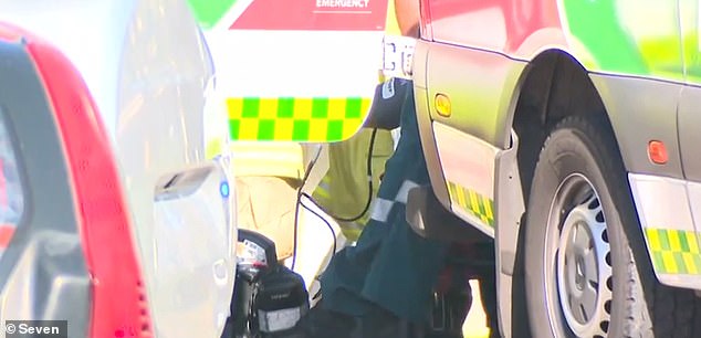 The elderly woman was trapped under the car after the collision and had to be rescued by firefighters before being rushed to hospital (pictured).