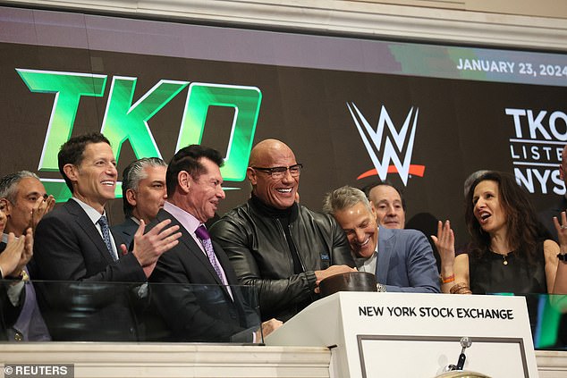 Johnson is seen here with McMahon at the New York Stock Exchange in late January.