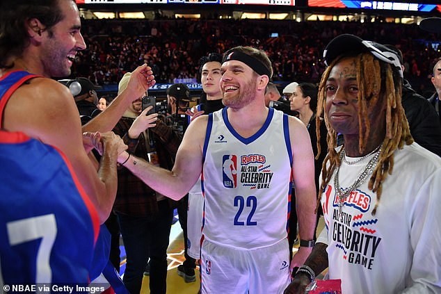 Conor Daly and Lil Wayne are seen during the NBA Ruffles All-Star Celebrity Game