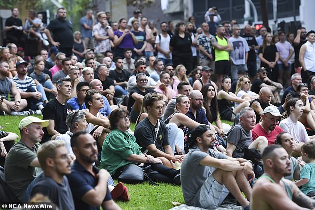 Hundreds of people gathered to remember Baird and Davies at a silent vigil in Sydney (pictured) on the eve of Mardi Gras celebrations on Friday.