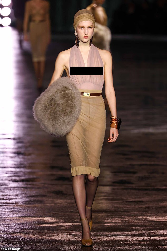 A model walks the runway during the Saint Laurent Womenswear Fall/Winter 2024-2025 show as part of Paris Fashion Week.