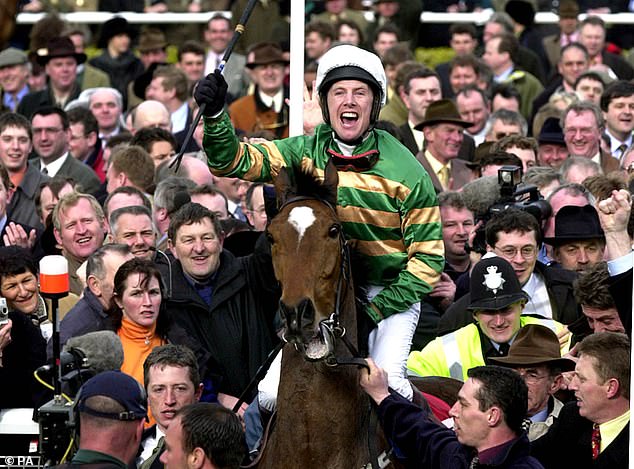 Swan won his third consecutive Champion Hurdle aboard Istabraq in 2000 (above)