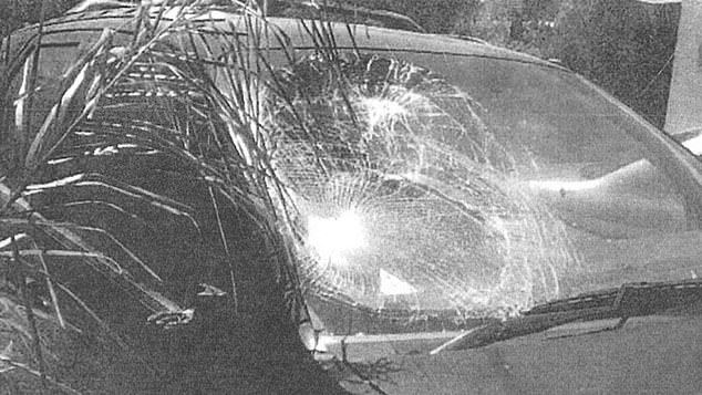 Police photocopied originals show the SUV's windshield shattered by a strong impact on the driver's side.