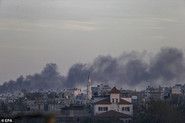 Smoke rises after an Israeli airstrike during a military operation in Khan Yunis, southern Gaza Strip.