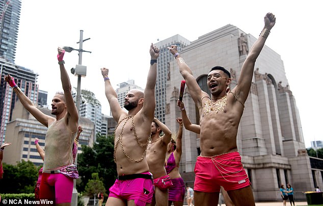 The Saturday night Mardi Gras parade will begin at the corner of Hyde Park and Oxford in Sydney on Saturday night at 7:30 pm (pictured, people in the Mardi Gras parade)