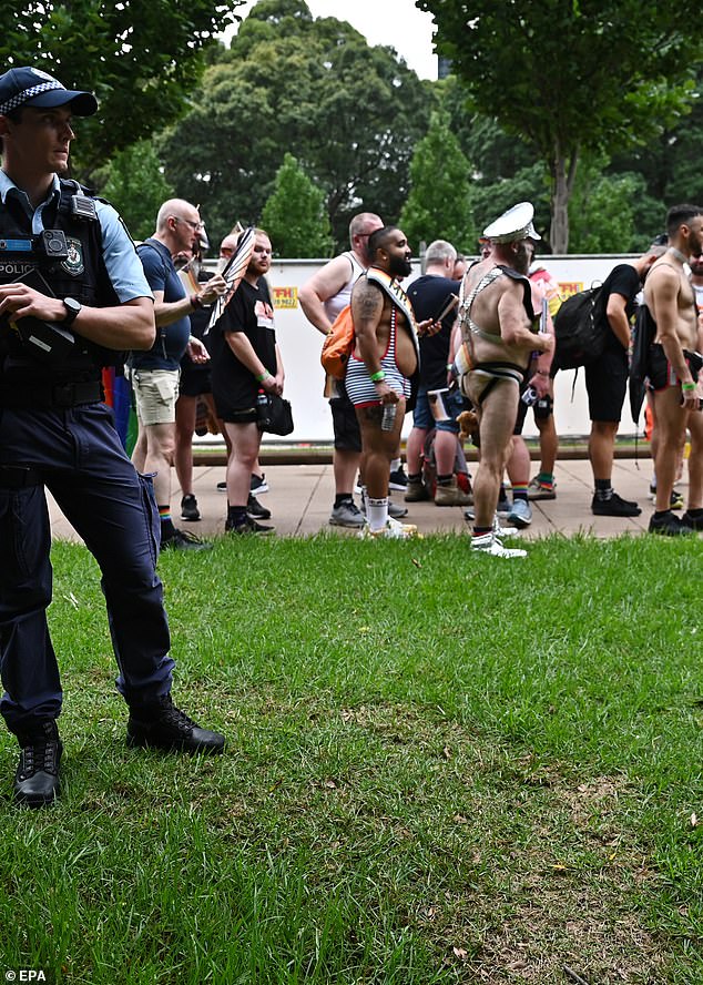 NSW Police officers (pictured left) were allowed to march in the parade after not previously being invited to the event.