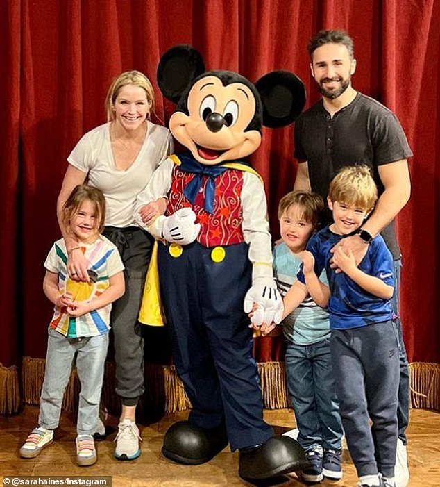 The television host photographed with her husband Max Shifrin and their three children at Disneyland in November 2023.