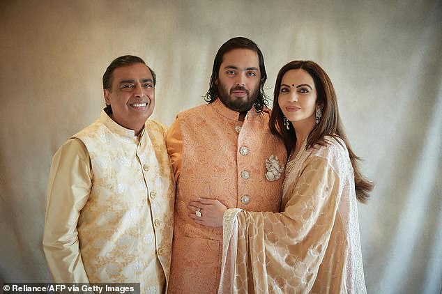 Billionaire tycoon Mukesh Ambani (left) and his wife Nita Ambani, chairperson and founder of Reliance Foundation with their son Anant Ambani.