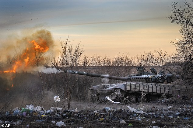 A Ukrainian tank from the 17th Tank Brigade fires at Russian positions in Chasiv Yar, the site of fierce fighting with Russian troops in the Donetsk region, on February 29.