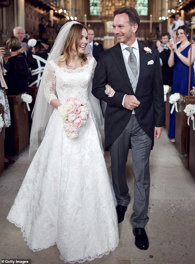 The couple is pictured on their wedding day in Woburn on May 15, 2015.