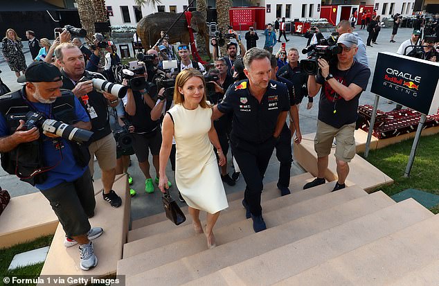 As they climbed the stairs to Red Bull's rooms, Horner put his hand on his wife's back.