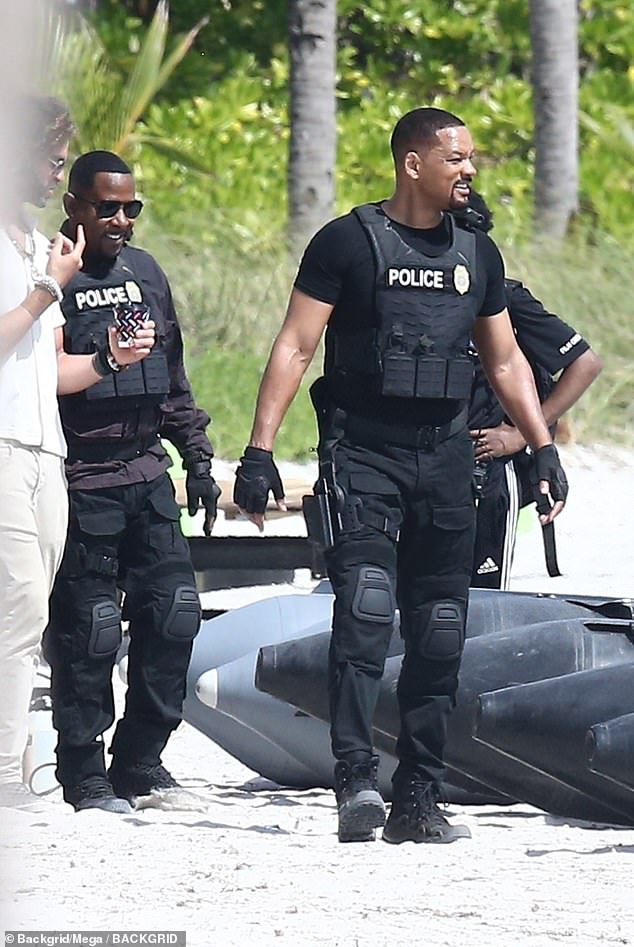 Hollywood good boys Will Smith and Martin Lawrence are getting hot on the set of Bad Boys 4 while filming at a local beach in Miami. The production spent $500,000 on police support, but has faced criticism for displacing homeless people.