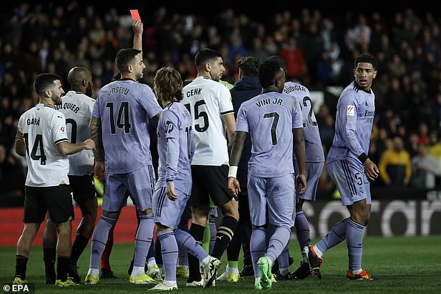 He was later given a red card for his troubles in chaotic scenes at Valencia's Mestalla pitch.
