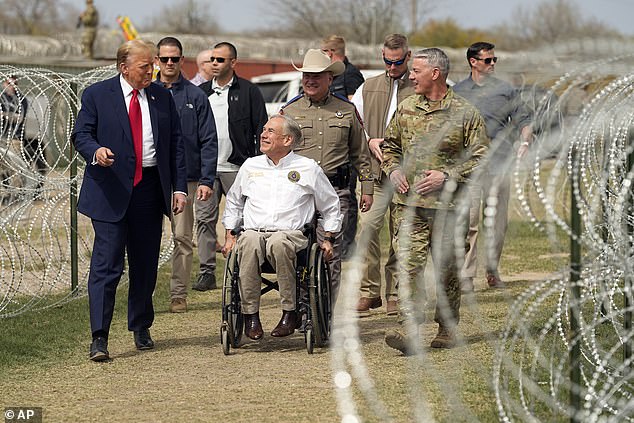 Republican presidential candidate former President Donald Trump speaks with Texas Governor Greg Abbott during a visit to the US-Mexico border on Thursday in Eagle Pass, Texas.