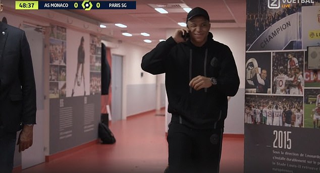 Mbappé was seen talking on the phone in the tunnel at the start of the second half in Monaco