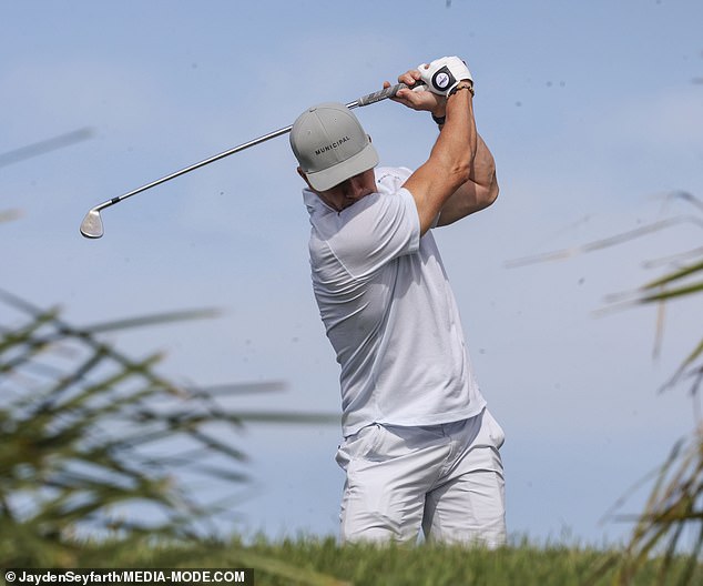 1709452694 407 Mark Wahlberg enjoys a round of golf with friends in