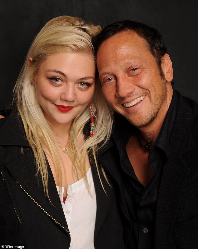 Elle and her father Rob Schneider in 2009