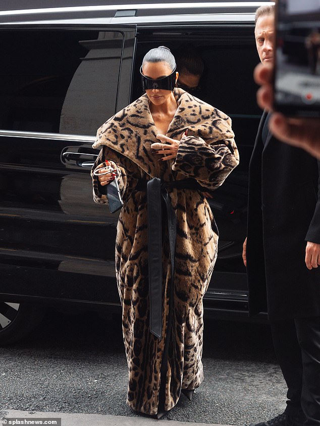 Kim cut a modern figure as she channeled her inner mafia wife's aesthetic and donned a fabulous animal-print Balenciaga fur coat.