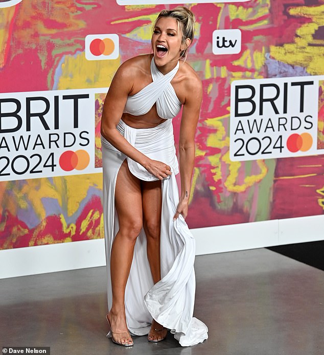 Earlier in the night, Ashley laughed off a wardrobe malfunction in her barely-there white dress at the 2024 BRIT Awards.