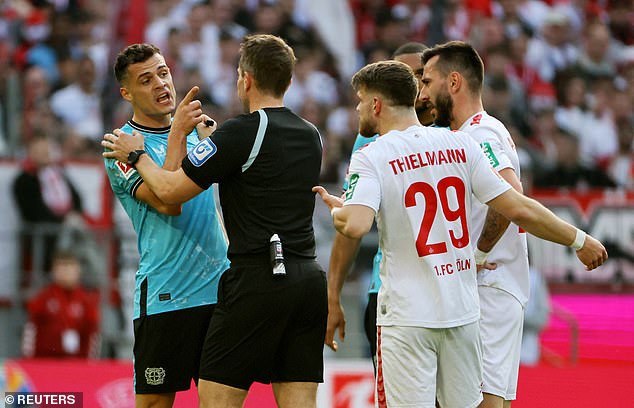 Thielmann had fouled Granit Xhaka (left), who was visibly incensed by the challenge.