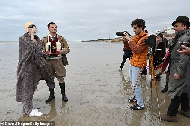 Victoria Summer and David Aitchison film scenes for Vindication Swim on Brighton beach on April 6, 2021