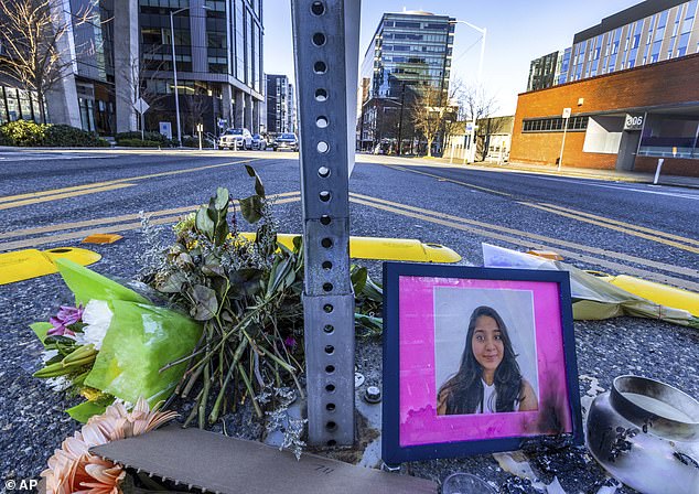 A photo of Jaahnavi Kandula is shown with flowers, on January 29, 2023 in Seattle.
