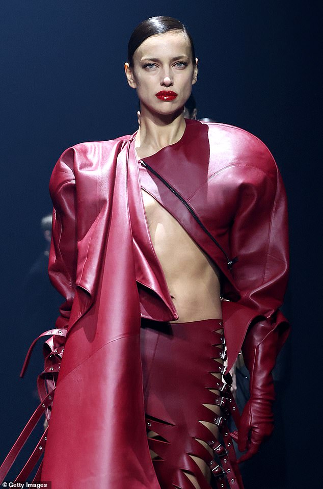 The supermodel rocked an extravagant red leather look that left very little to the imagination.