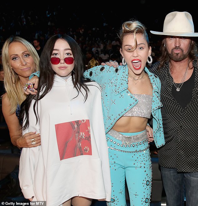 However, a source close to the Cyrus family told DailyMail.com that Noah and Dominic were never involved (Tish, Noah, Miley and Billy Ray Cyrus, 62, together in 2017).