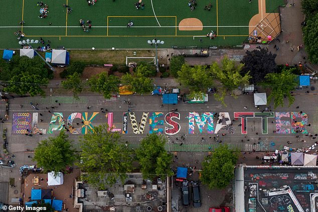 An aerial view of a Black Lives Matter mural in Seattle, in what was initially known as the Capitol Hill Autonomous Zone, which spanned several blocks around the Seattle Police Department's East Precinct.