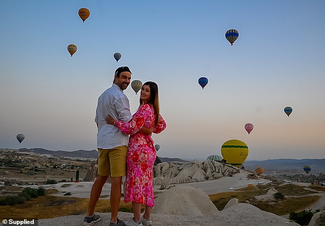 The adventurous New Zealand couple has been traveling the world for a year (pictured in Cappadocia, Turket)