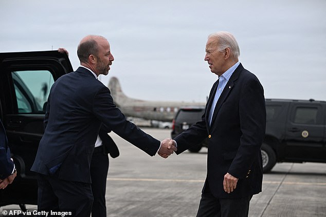 President Joe Biden greets Brownsville Mayor John Cowen upon his arrival in Brownsville, Texas, on Thursday, where he met with federal border patrol agents.