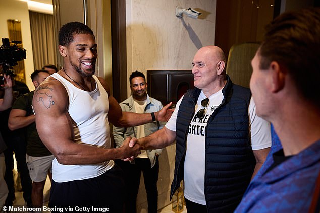 Joshua met Fury's father John in Riyadh ahead of his fight with Ngannou later this week.