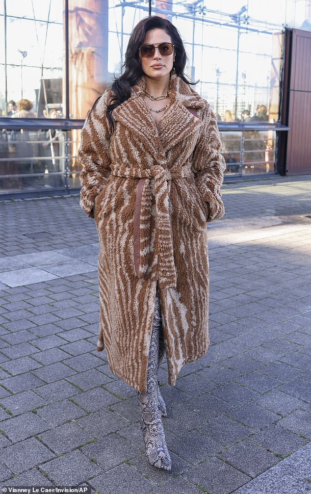 Model Ashley Graham, 36, also made a stylish appearance at the event in a cozy beige coat and long snakeskin boots.