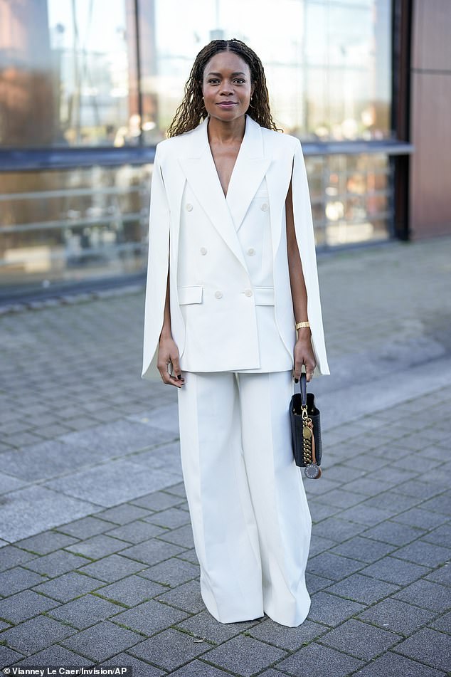 Actress Naomie Harris, 47, looked sophisticated in a white jacket and flared pants as she arrived.