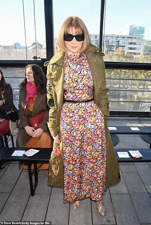 Anna Wintour opted for a floral look combined with a green coat