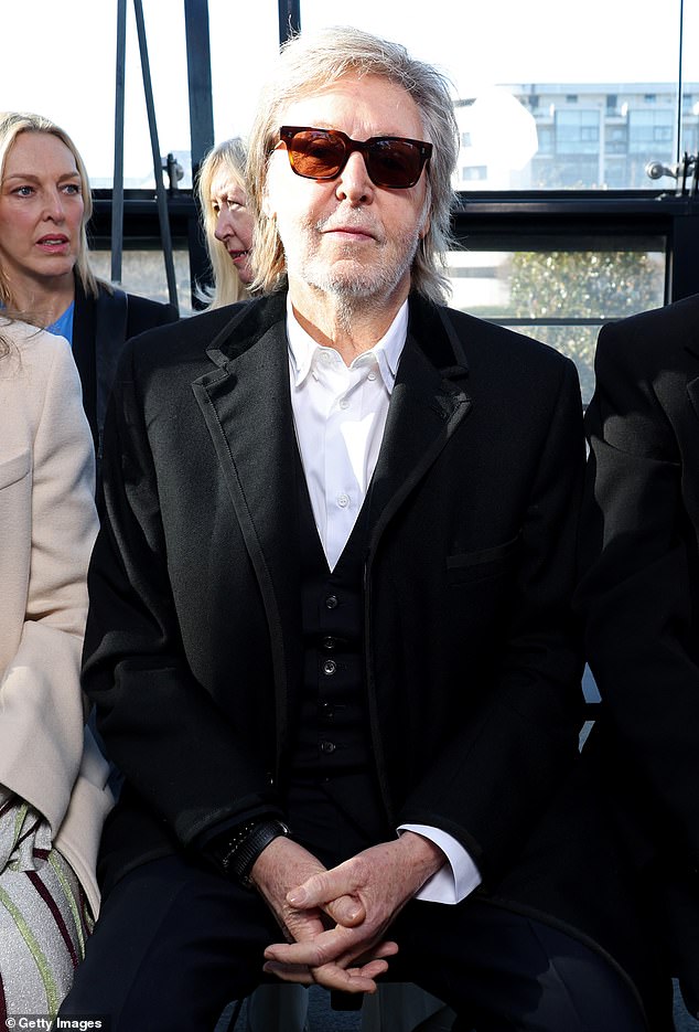 Stella's famous father, Paul McCartney, was also at FROW to support her and looked great in a black suit and white shirt.