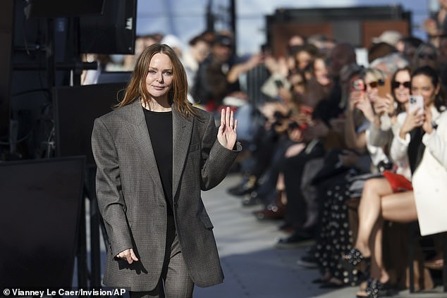 After the show, Stella McCartney, 52, walked the runway to rapturous applause, smiling at her family as she passed.