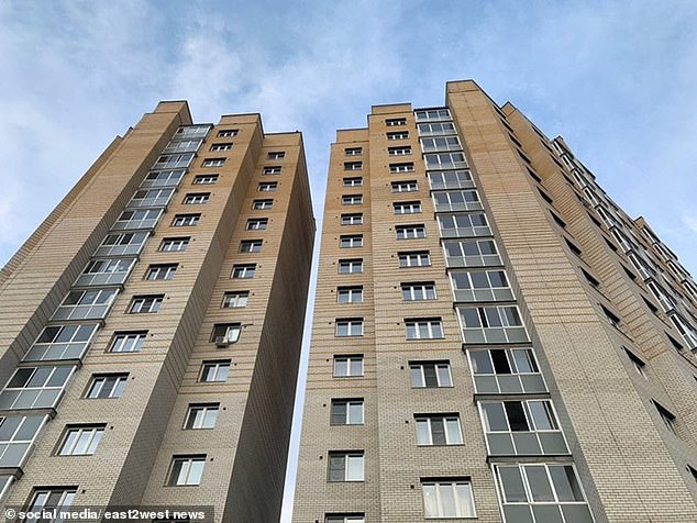 The evil killer threw part of Ekaterina's dismembered body into a local river. He then drank all night and the next day threw her severed head along with other parts of her body and blood-stained clothes out of a 12th floor window (pictured) of her rented apartment. .