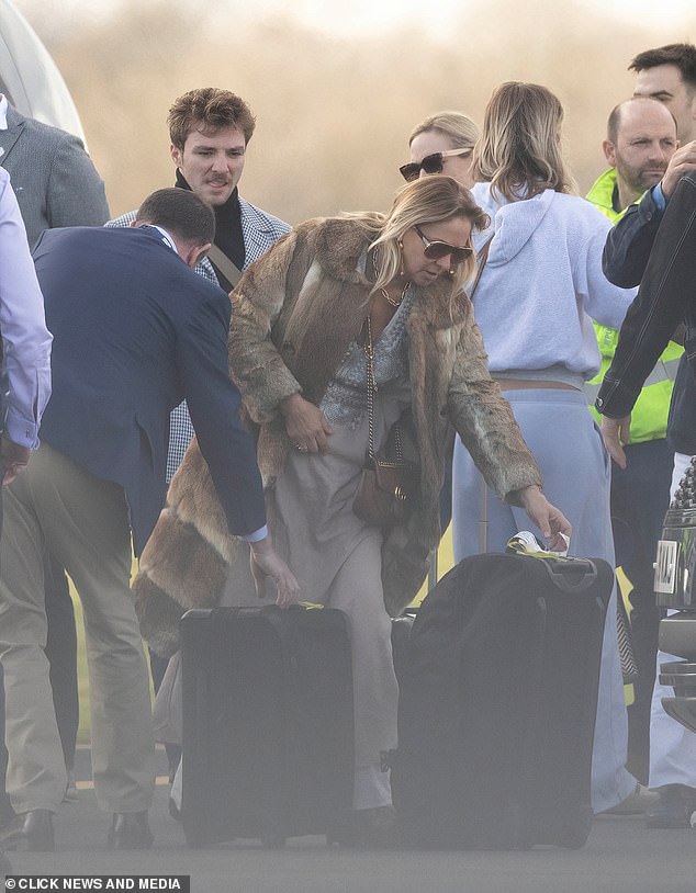 Rocco Ritchie, 23, looked to be the spitting image of his father as he landed in Oxford today.
