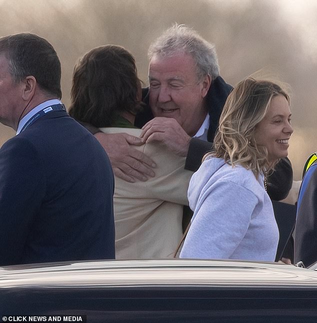 Pictured: Jeremy Clarkson seen hugging billionaire insurance tycoon David Howden after traveling back to the UK on the same private jet.