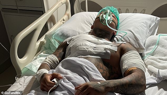 Wilson is seen in hospital after being stabbed in Bali.