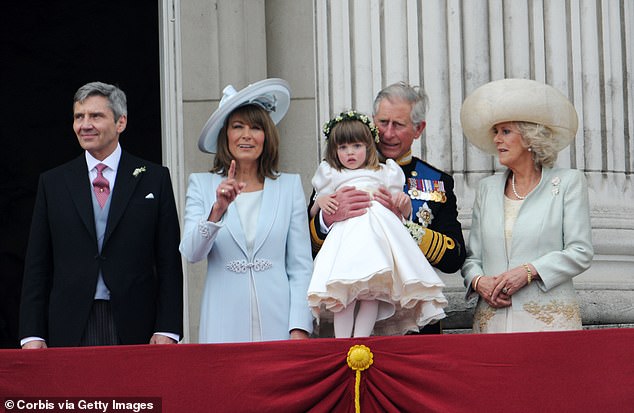 Carole Middleton with her husband Michael, Charles and Camilla on the balcony of Buckingham Palace after the wedding of Prince William and Kate Middleton in April 2011.
