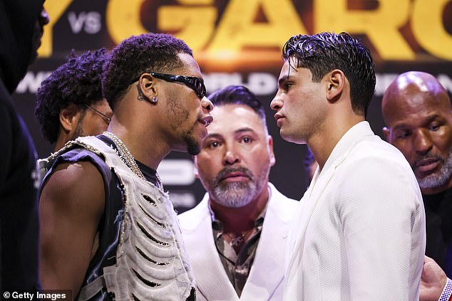 Garcia is due to fight Devin Haney (left) in a grudge match next month.
